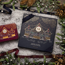 Load image into Gallery viewer, Metzger is pleased to bring you the magic of Viennese Christmas markets with a luxury chocolate box in navy, filled with 25 delectable Lebkuchen pralines. Each praline is layered with Lebkuchen 'honey cake' and filled with marzipan, nuts or fruit jams and jellies, encased in rich chocolate. Suitable for vegetarians.