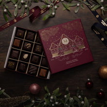 Load image into Gallery viewer, Metzger is pleased to bring you the magic of Viennese Christmas markets with a luxury chocolate box in bordeaux red, filled with 25 delectable Lebkuchen pralines. Each praline is layered with Lebkuchen 'honey cake' and filled with marzipan, nuts or fruit jams and jellies, encased in rich chocolate. Vegetarian friendly.