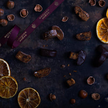 Load image into Gallery viewer, Juicy Lebkuchen bites with a rich mix of fried fruits and nuts, encased in high quality dark chocolate. The high quality chocolate couvertures enchant with an intense chocolate taste, perfectly complimenting our Lebkuchen and fillings. A true Christmas staple.