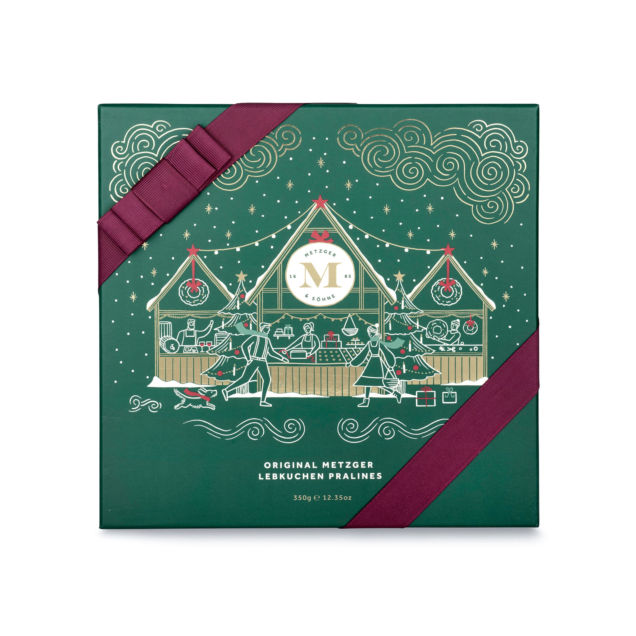 Metzger is pleased to bring you the magic of Viennese Christmas markets with a luxury chocolate box in emerald green, filled with 25 delectable Lebkuchen pralines. Each praline is layered with Lebkuchen 'honey cake' and filled with marzipan, nuts or fruit jams and jellies, encased in rich chocolate.