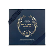 Load image into Gallery viewer, A perfect gift for a special occasion. Metzger's signature luxury box in opulent navy, filled with with 25 delectable Lebkuchen chocolate pralines. Each praline is layered with Lebkuchen 'honey cake' and filled with marzipan, nuts or fruit jams and jellies, encased in rich chocolate. Suitable for vegetarians.