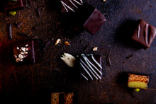 Load image into Gallery viewer, 6 handcrafted Lebkuchen 'honey cake' pralines filled with fine pistachio marzipan and rich nougat, coated in rich, dark chocolate and topped with sprinkles of pistachio. The perfect treat for those who love nougat and pistachio. The high quality chocolate couvertures enchant with an intense chocolate taste, complimenting our Lebkuchen and opulent fillings.