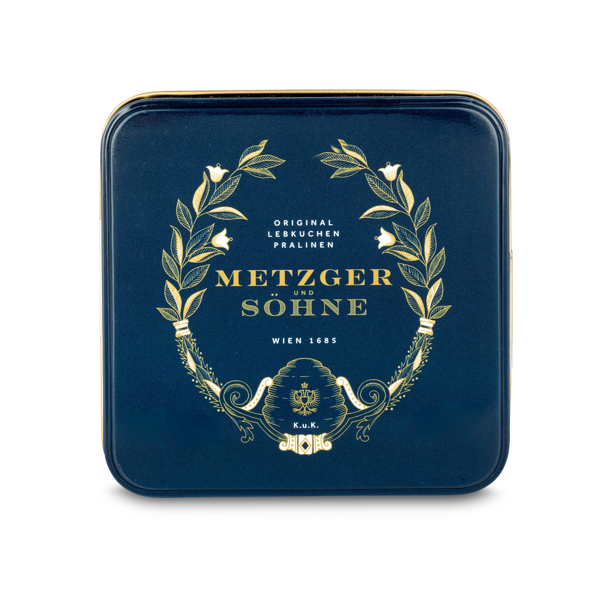 Metzger signature tin in navy blue filled with 9 different Lebkuchen 'honey cake' pralines filled with marzipan, fruits, nuts or jelly, encased in chocolate.