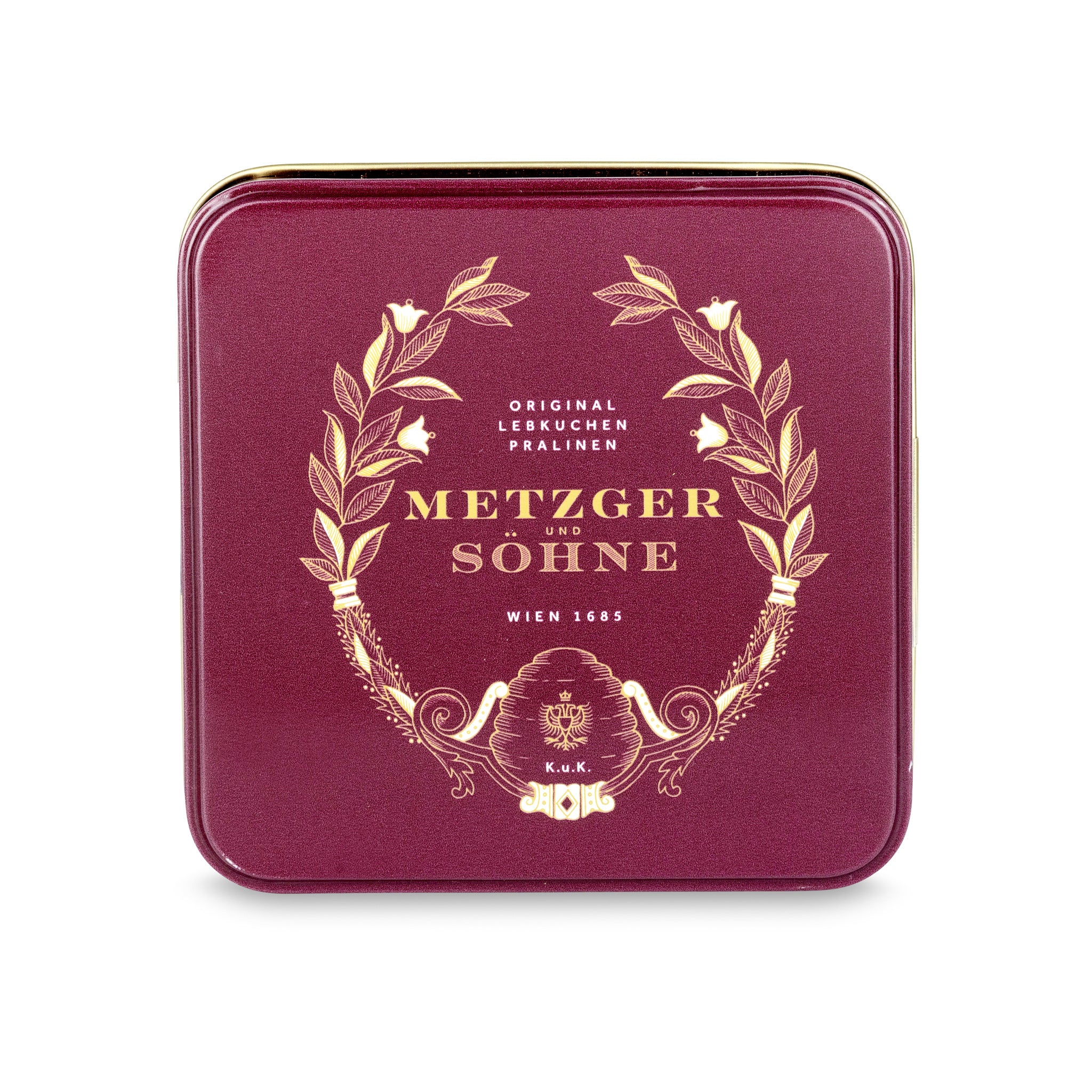 A perfect gift for a special occasion. Metzger's signature luxury tin in opulent red, filled with with 9 delectable Lebkuchen chocolate pralines. Each praline is layered with Lebkuchen 'honey cake' and filled with marzipan, nuts or fruit jams and jellies, encased in rich chocolate. Suitable for vegetarians.