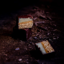 Load image into Gallery viewer, 6 handcrafted Lebkuchen 'honey cake' pralines filled with delicate orange marzipan and coated in rich, dark chocolate. A little taste of christmas in every bite. The high quality chocolate couvertures enchant with an intense chocolate taste to compliment our Lebkuchen and opulent marzipan filling. Our chocolate is made with cocoa butter and refined with natural Bourbon vanilla, free of external fats.