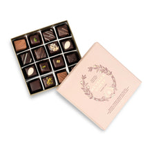 Load image into Gallery viewer, A perfect gift for a special occasion. Metzger's signature luxury box in delicate pink, filled with with 16 delectable Lebkuchen chocolate pralines. Each praline is layered with Lebkuchen 'honey cake' and filled with marzipan, nuts or fruit jams and jellies, encased in rich chocolate. Suitable for vegetarians.