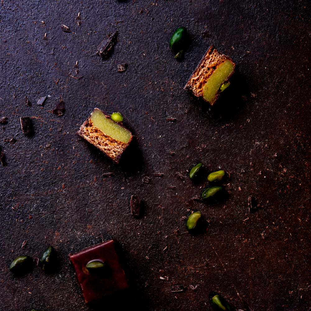 6 handcrafted Lebkuchen 'honey cake' pralines filled with the finest pistachio marzipan, coated in rich, dark chocolate and topped with deep green pistachio. The perfect treat for those who love marzipan and pistachio.