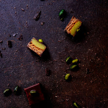 Load image into Gallery viewer, 6 handcrafted Lebkuchen 'honey cake' pralines filled with the finest pistachio marzipan, coated in rich, dark chocolate and topped with deep green pistachio. The perfect treat for those who love marzipan and pistachio.