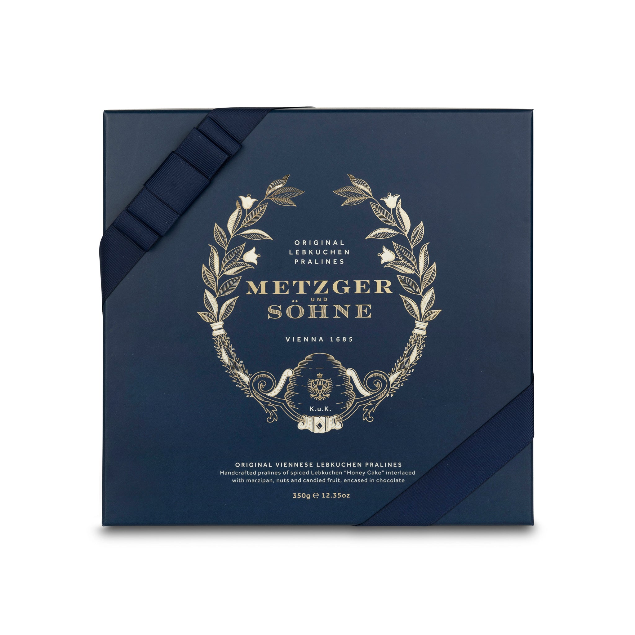 A perfect gift for a special occasion. Metzger's signature luxury box in opulent navy, filled with with 25 delectable Lebkuchen chocolate pralines. Each praline is layered with Lebkuchen 'honey cake' and filled with marzipan, nuts or fruit jams and jellies, encased in rich chocolate. Suitable for vegetarians.