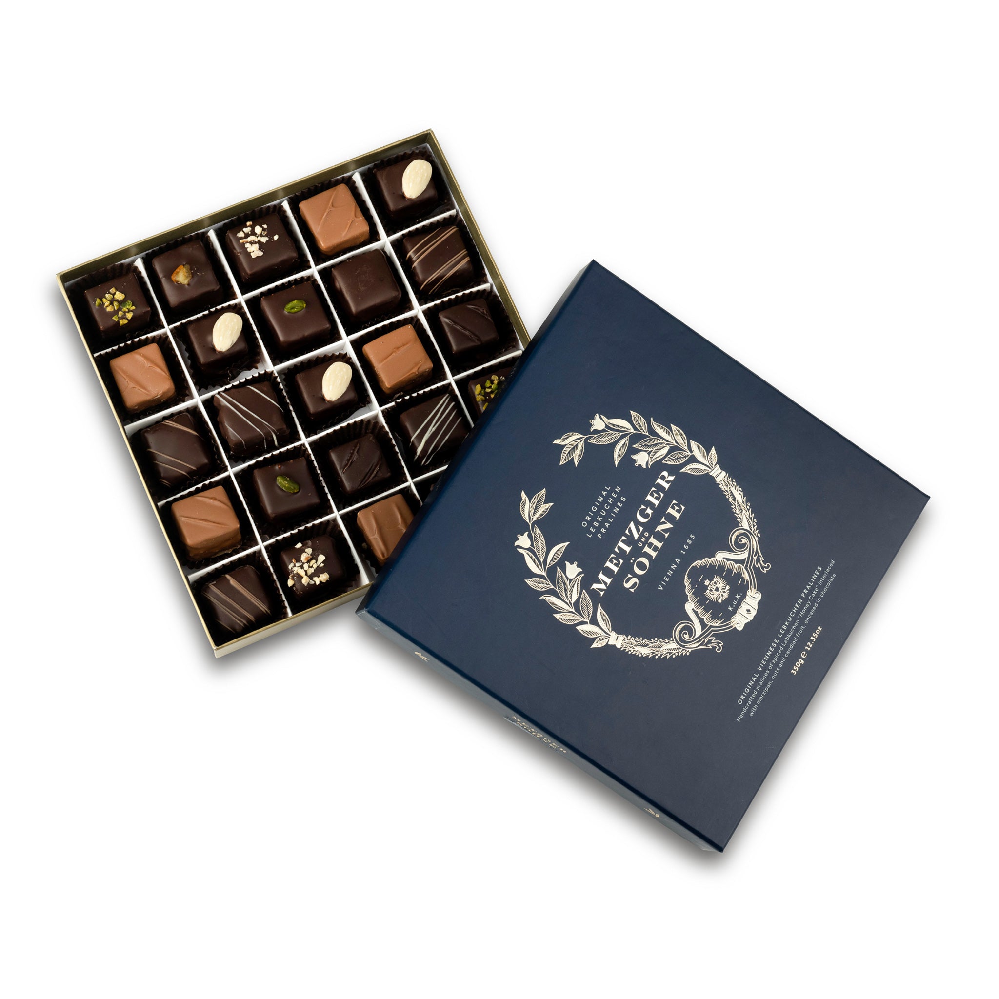 A perfect gift for a special occasion. Metzger's signature luxury box in opulent navy, filled with with 25 delectable Lebkuchen chocolate pralines. Each praline is layered with Lebkuchen 'honey cake' and filled with marzipan, nuts or fruit jams and jellies, encased in rich chocolate. Suitable for vegetarians.