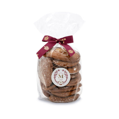 Our Honey Lebkuchen is our signature House Lebkuchen that forms the basis of all our specialities. Metzger Lebkuchen is Viennese gingerbread with a soft texture and subtle taste. The honey dough is refined with spices, topped with almonds and glazed with sugar after baking. House Lebkuchen is a true Viennese staple at the Christmas table.