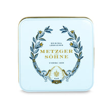 Load image into Gallery viewer, A perfect gift for a special occasion. Metzger&#39;s signature luxury tin in ice blue, filled with with 9 delectable Lebkuchen chocolate pralines. Each praline is layered with Lebkuchen &#39;honey cake&#39; and filled with marzipan, nuts or fruit jams and jellies, encased in rich chocolate. Suitable for vegetarians.