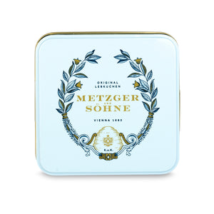 A perfect gift for a special occasion. Metzger's signature luxury tin in ice blue, filled with with 9 delectable Lebkuchen chocolate pralines. Each praline is layered with Lebkuchen 'honey cake' and filled with marzipan, nuts or fruit jams and jellies, encased in rich chocolate. Suitable for vegetarians.