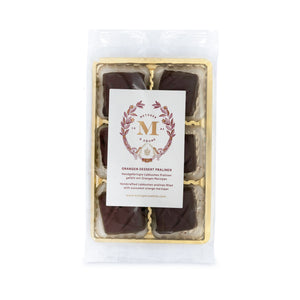 6 handcrafted Lebkuchen 'honey cake' pralines filled with delicate orange marzipan and coated in rich, dark chocolate. A little taste of christmas in every bite. The high quality chocolate couvertures enchant with an intense chocolate taste to compliment our Lebkuchen and opulent marzipan filling. Our chocolate is made with cocoa butter and refined with natural Bourbon vanilla, free of external fats.