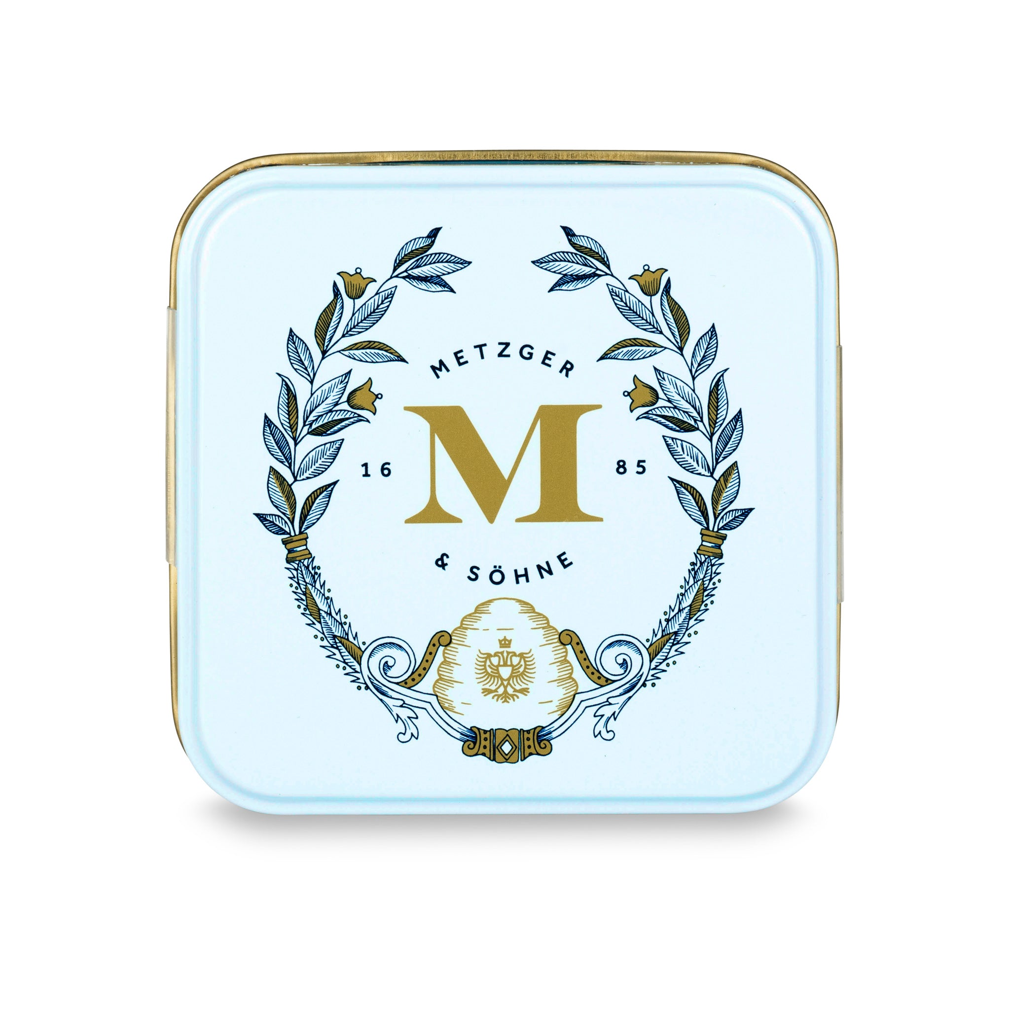 Petit Metzger signature tin in pastel blue filled with 4 different Lebkuchen 'honey cake' pralines: almond, orange marzipan, nut rum and aranzini.