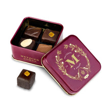 Load image into Gallery viewer, Petit Metzger signature tin in red filled with 4 different Lebkuchen &#39;honey cake&#39; pralines.