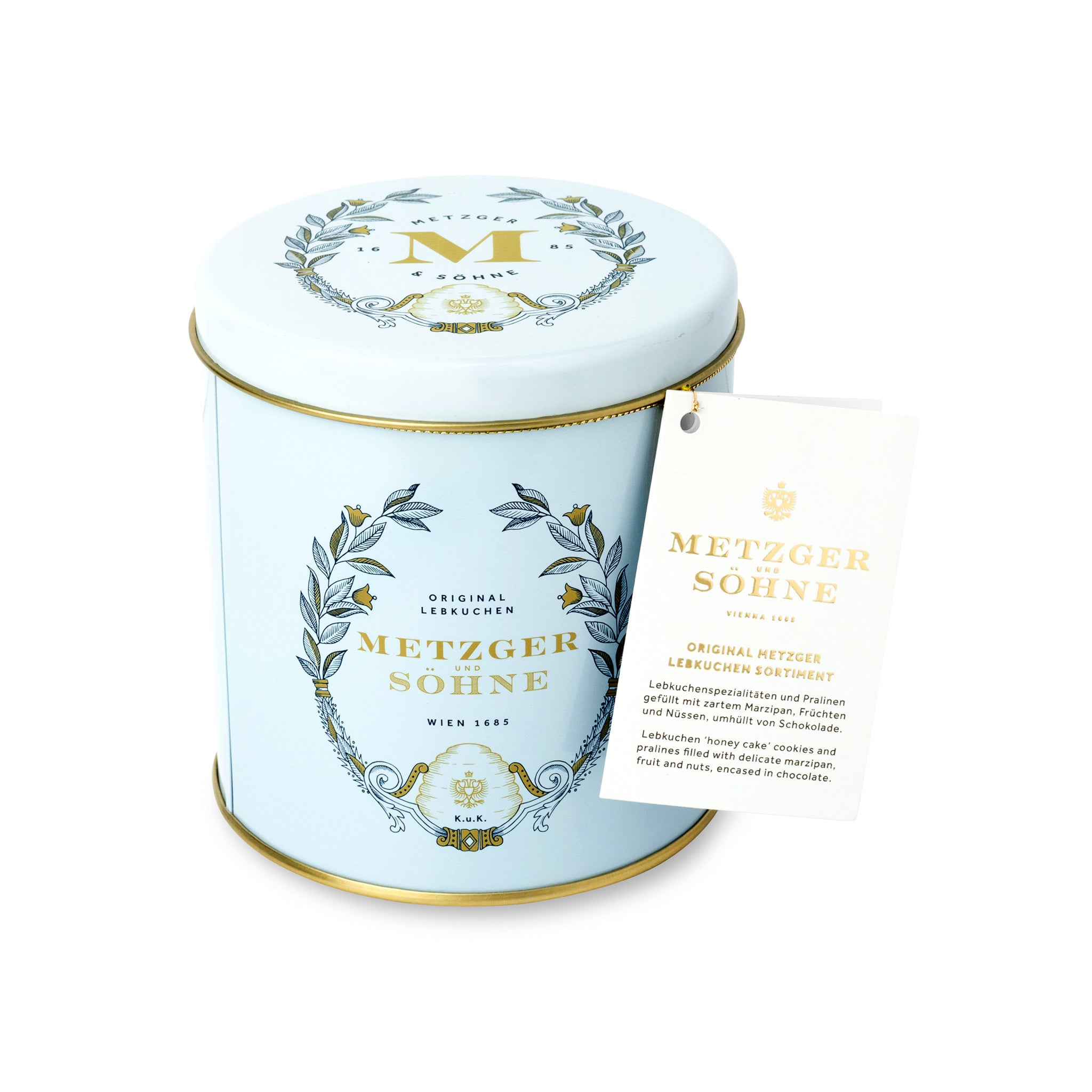 Luxury Metzger gift tin in blue, filled with our popular Lebkuchen cookies and chocolate pralines. There are 10 opulent praline types, from marzipan mixes to fruit jellies, jams and nut fillings, coated in chocolate. The Lebkuchen cookies include our fruit bread with dried fruits and nuts, basler with a cherry undertone, chocolate robbins, signature house Lebkuchen and Aranzini Lebkuchen minis. A perfect Lebkuchen taster gift or selection for the Christmas table.