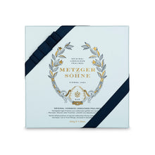 Load image into Gallery viewer, A perfect gift for a special occasion. Metzger&#39;s signature luxury box in ice blue, filled with with 16 delectable Lebkuchen chocolate pralines. Each praline is layered with Lebkuchen &#39;honey cake&#39; and filled with marzipan, nuts or fruit jams and jellies, encased in rich chocolate. Suitable for vegetarians.